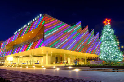 Polygon Gallery in North Vancouver with Christmas lights and tree lit up at night